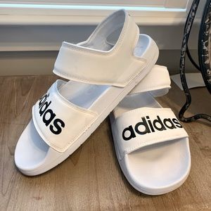 Adilette Adidas Sandals size 7 Womens. Worn less than 5 times. Wide sole.
